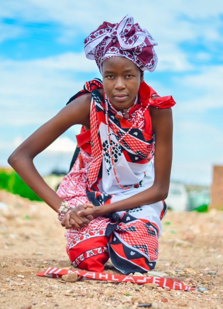 Young Traditional Health Practitioner in traditional attire representing youth participation in Indigenous Knowledge Systems and Traditional Health Practice in South Africa.